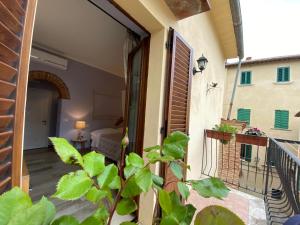 - Balcón con vistas a una habitación en Il Buonumore, en Montepulciano