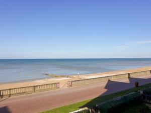 a view of a beach and the ocean at Apartment Cabourg Beach by Interhome in Cabourg