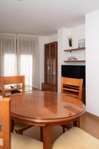 Telewizja i/lub zestaw kina domowego w obiekcie Apartamentos A Laxe