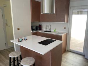Kuchyňa alebo kuchynka v ubytovaní Apartamento Turístico Ávila VUT
