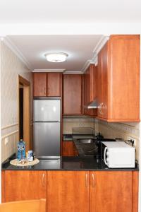 Kuchnia lub aneks kuchenny w obiekcie Apartamentos A Laxe