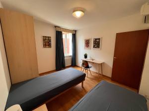 Letto o letti in una camera di Appartamenti Baia Azzurra 4.