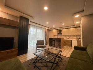 Kuchyň nebo kuchyňský kout v ubytování On4 Rooms & Suites