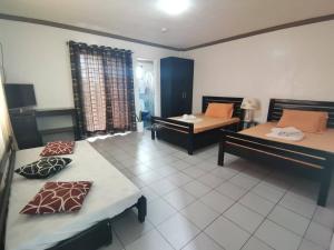 Postel nebo postele na pokoji v ubytování AA TRAVELLERS PAD + 5 fotografií