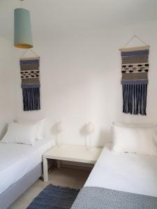 Giường trong phòng chung tại Casa Ble - Izla Homes