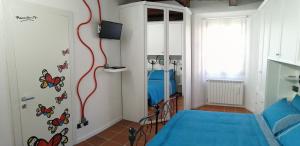 Il Sasso appartamento tesisinde bir odada yatak veya yataklar