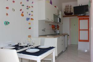 Kuchyň nebo kuchyňský kout v ubytování Apartments Blue Sea