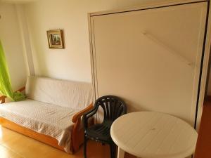 Postel nebo postele na pokoji v ubytování Apartamentos Vacacionales Atlanterra