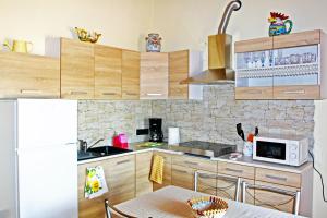 Kuchyň nebo kuchyňský kout v ubytování Casa Laura, Fosdinovo - Stile e Relax a 5 stelle
