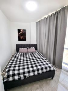 Postel nebo postele na pokoji v ubytování Sima Suite