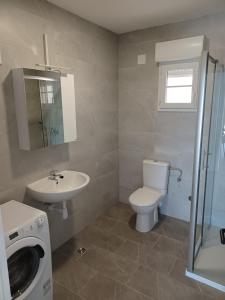 Kúpeľňa v ubytovaní APARTMANI JELIĆ