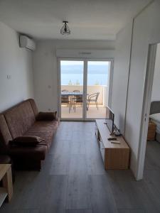 Posedenie v ubytovaní APARTMANI JELIĆ