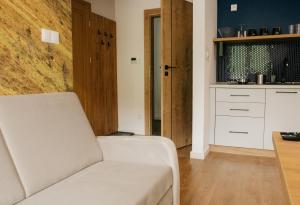 Posezení v ubytování Rajskie Uroczysko Apartamenty Jacuzzi Sauna