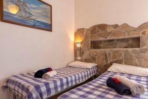 Ένα ή περισσότερα κρεβάτια σε δωμάτιο στο Pergola 705