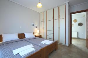 Postel nebo postele na pokoji v ubytování Villa-Ruby