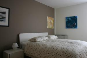 Postel nebo postele na pokoji v ubytování Apartments Tim