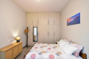 Postel nebo postele na pokoji v ubytování Souda apartment