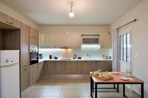 Kuchyň nebo kuchyňský kout v ubytování Souda apartment