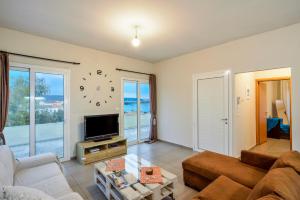TV a/nebo společenská místnost v ubytování Souda apartment