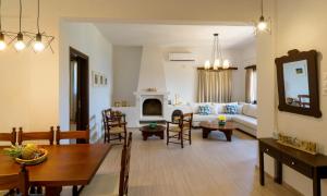 A seating area at Ammoudara Bay Villa