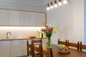 A kitchen or kitchenette at Ammoudara Bay Villa