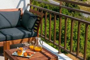 A balcony or terrace at Ammoudara Bay Villa