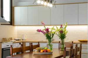 A kitchen or kitchenette at Ammoudara Bay Villa