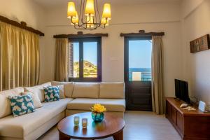 A seating area at Ammoudara Bay Villa