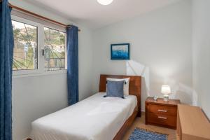 Postel nebo postele na pokoji v ubytování Terrace Vila II by An Island Apart