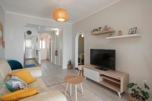 TV a/nebo společenská místnost v ubytování Terrace Vila II by An Island Apart