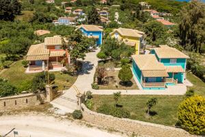 an aerial view of a village with houses at Porto Gerakas Villas in Vasilikos