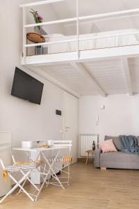 TV a/nebo společenská místnost v ubytování Mare all'Arco Casa Vacanze