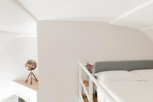 Postel nebo postele na pokoji v ubytování Mare all'Arco Casa Vacanze