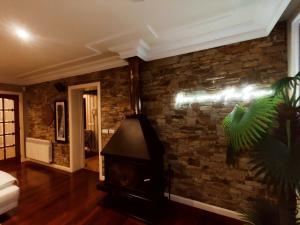 A bed or beds in a room at HHC - Holidays House Compostela