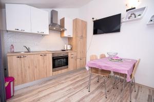 Kuchyň nebo kuchyňský kout v ubytování Apartment Josipa