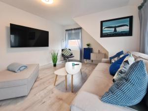 TV a/nebo společenská místnost v ubytování Friesenstraße 13