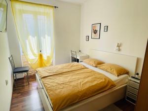 Posteľ alebo postele v izbe v ubytovaní Apartman Three Queens