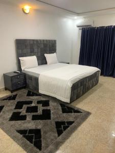 Llit o llits en una habitació de Weena Hotel & Resort