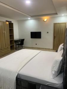 Voodi või voodid majutusasutuse Weena Hotel & Resort toas