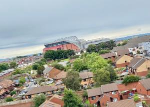 an aerial view of a residential suburb with a stadium at Unique view of Anfield stadium - Charming 2 bedroom apartment in Liverpool with parking in Liverpool
