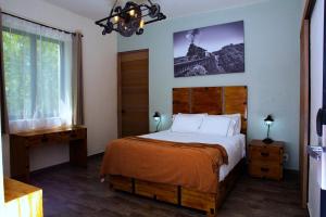 Cama o camas de una habitación en Hotel Boutique Rancho San Juan Teotihuacan