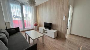A television and/or entertainment centre at 2 room apartment with terrace, Prievozska street