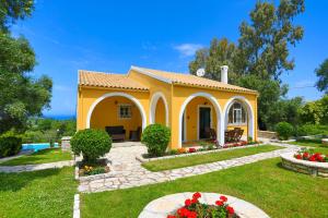 A garden outside Villa Joanna