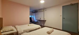 Postel nebo postele na pokoji v ubytování Misto Hotel