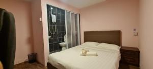 Postel nebo postele na pokoji v ubytování Misto Hotel