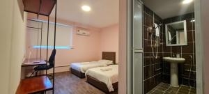 Postel nebo postele na pokoji v ubytování Misto Hotel