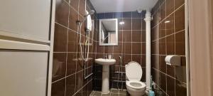 Koupelna v ubytování Misto Hotel