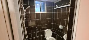 Koupelna v ubytování Misto Hotel