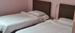 Postel nebo postele na pokoji v ubytování Misto Hotel