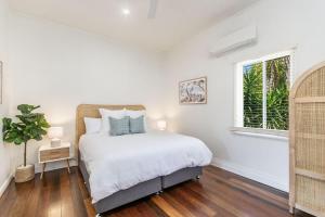 Katil atau katil-katil dalam bilik di High Three - Downtown Beach House
